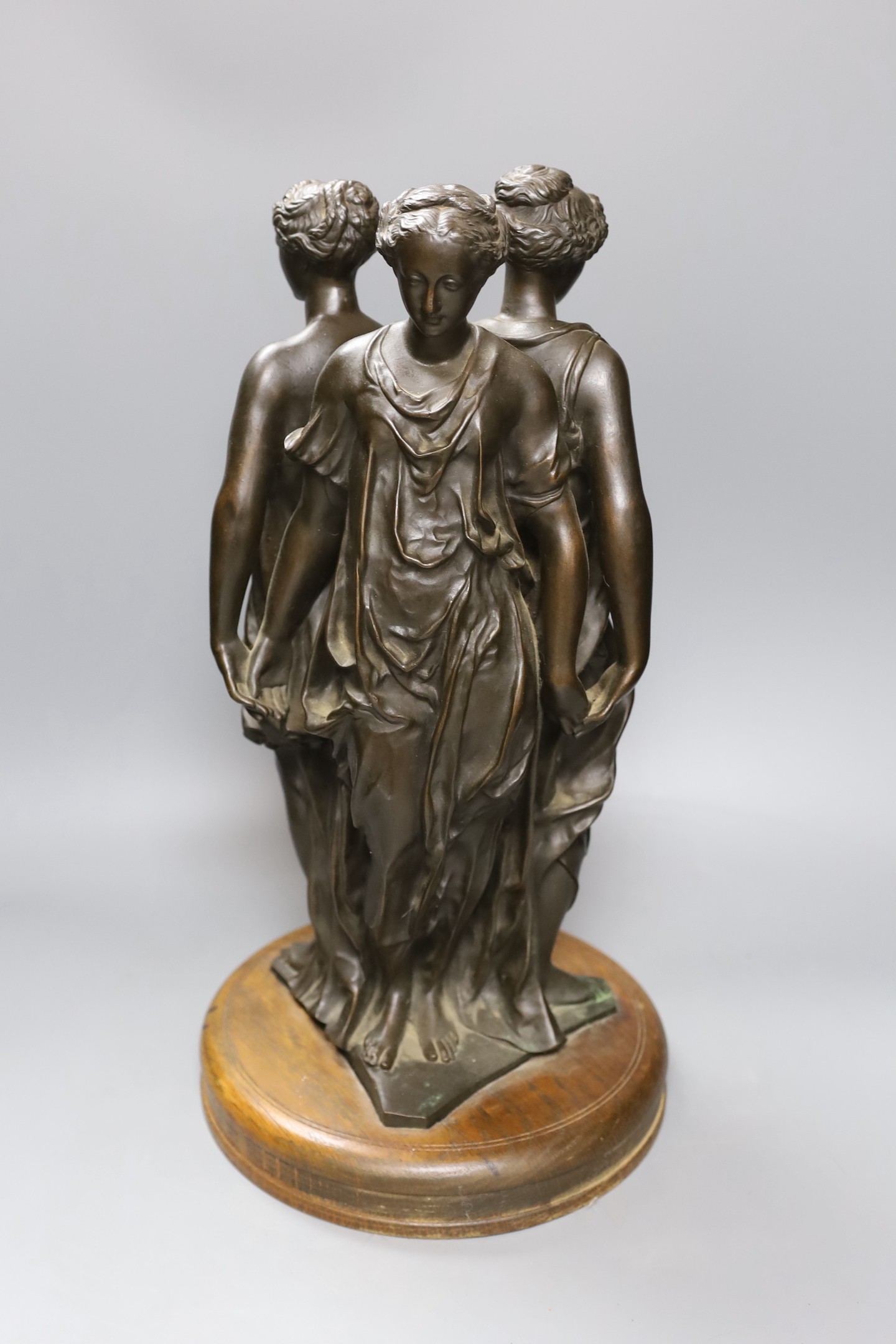 A Reduction de Sauvage bronze group 'The Three Graces', 44cms high including base.
